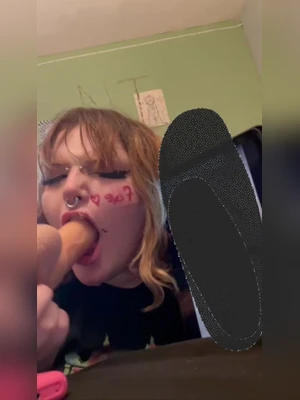 Watching sex videos while giving blowjob