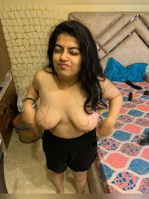 Chubby girl showing her big booby